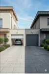 Porte de garage sectionnelle Master Premium – comparatif coloris blanc et gris anthracite RAL 7016 sur maisons jumelées