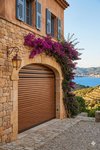 Porte de garage enroulable aluminium 77 isolee avec moteur - maison en pierre sur la Cote d Azur