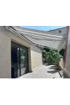Store banne Confort terrasse - lambrequin Soltis 92 en option