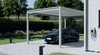 Carport aluminium autoporté sur mesure dans un jardin - borne de recharge véhicule