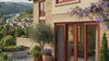 Porte-fenetre PVC 1 ouvrant oscillo-battant sur mesure Aluplast - maison en pierre dans la vallee du Lot