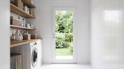 Porte de service PVC vitrée sur mesure – vue intérieure depuis la buanderie