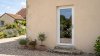Porte de service PVC vitrée sur mesure – vue extérieure, accès au jardin