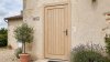 Porte d'entrée bois modèle M02 sur mesure — photo d'ambiance, pin naturel