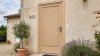Porte d'entrée bois modèle M03 sur mesure — photo d'ambiance, pin naturel