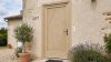 Porte d'entrée bois modèle M17 sur mesure — photo d'ambiance, pin naturel