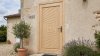 Porte d'entrée bois modèle M20 sur mesure — photo d'ambiance, pin naturel
