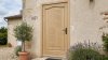 Porte d'entrée bois modèle M21 sur mesure — photo d'ambiance, pin naturel