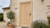 Porte d'entrée bois modèle M22 sur mesure — photo d'ambiance, pin naturel