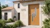 Porte d'entrée bois modèle 015 sur mesure — photo d'ambiance, chêne verni