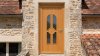 Porte d'entrée bois modèle 027 sur mesure — photo d'ambiance, chêne verni