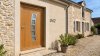 Porte d'entrée bois modèle 042 sur mesure — photo d'ambiance, chêne verni