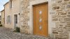 Porte d'entrée bois modèle 044 sur mesure — photo d'ambiance, chêne verni
