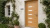 Porte d'entrée bois modèle 045 sur mesure — photo d'ambiance, chêne verni