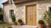 Porte d'entrée bois modèle 063 sur mesure — photo d'ambiance, chêne verni