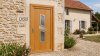 Porte d'entrée bois modèle 068 sur mesure — photo d'ambiance, chêne verni