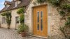 Porte d'entrée bois modèle 091 sur mesure — photo d'ambiance, chêne verni