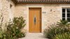 Porte d'entrée bois modèle 098 sur mesure — photo d'ambiance, chêne verni