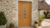 Porte d'entrée bois modèle 106 sur mesure — photo d'ambiance, chêne verni