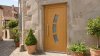 Porte d'entrée bois modèle 119 sur mesure — photo d'ambiance, chêne verni