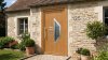 Porte d'entrée bois modèle 125 sur mesure — photo d'ambiance, chêne verni