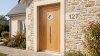 Porte d'entrée bois modèle 127 sur mesure — photo d'ambiance, chêne verni