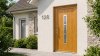 Porte d'entrée bois modèle 128 sur mesure — photo d'ambiance, chêne verni