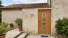 Porte d'entrée bois modèle 131 sur mesure — photo d'ambiance, chêne verni