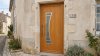 Porte d'entrée bois modèle 138 sur mesure — photo d'ambiance, chêne verni